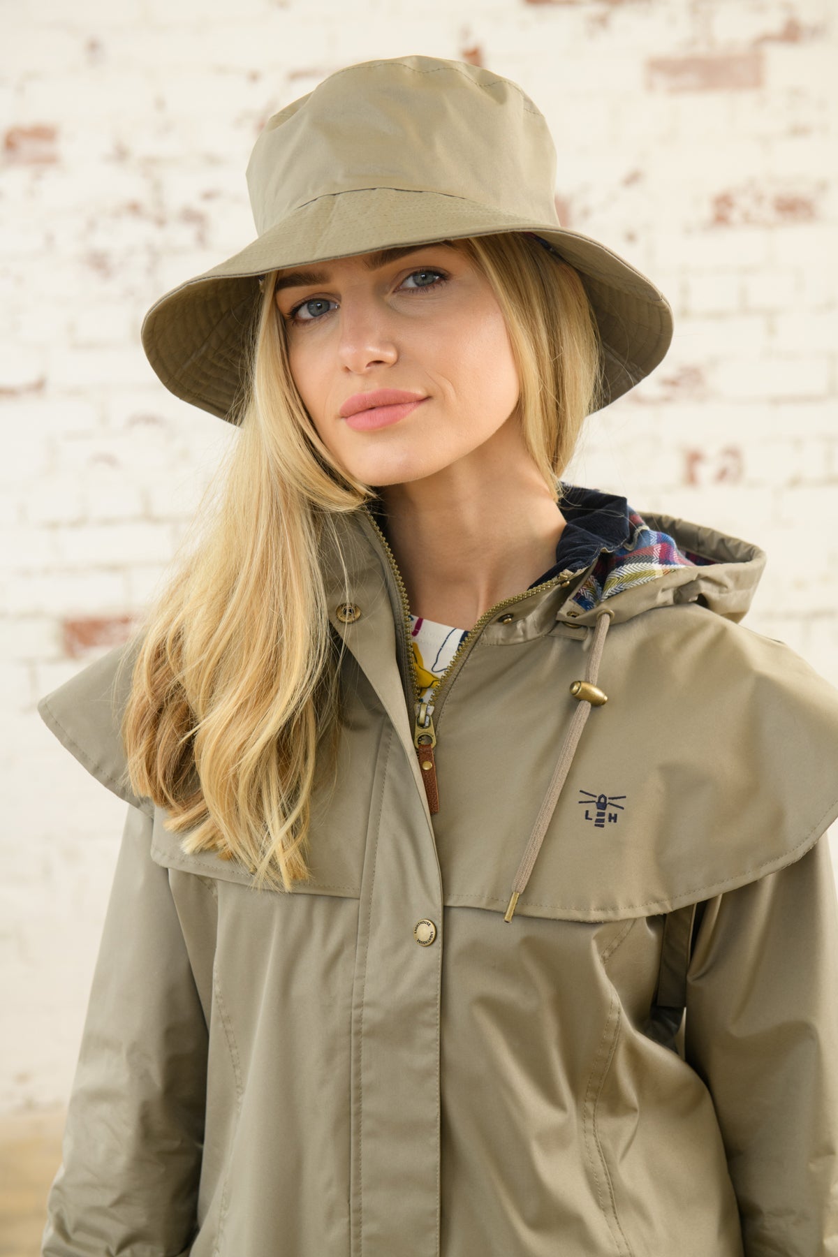 http://www.lighthouseclothing.co.uk/cdn/shop/products/storm-rain-hat-fawn-890071.jpg?v=1694614818