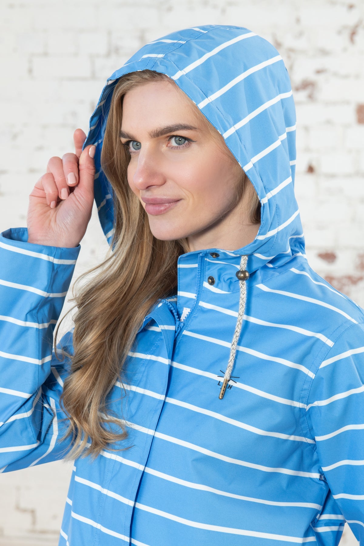 Blue and white striped raincoat hotsell